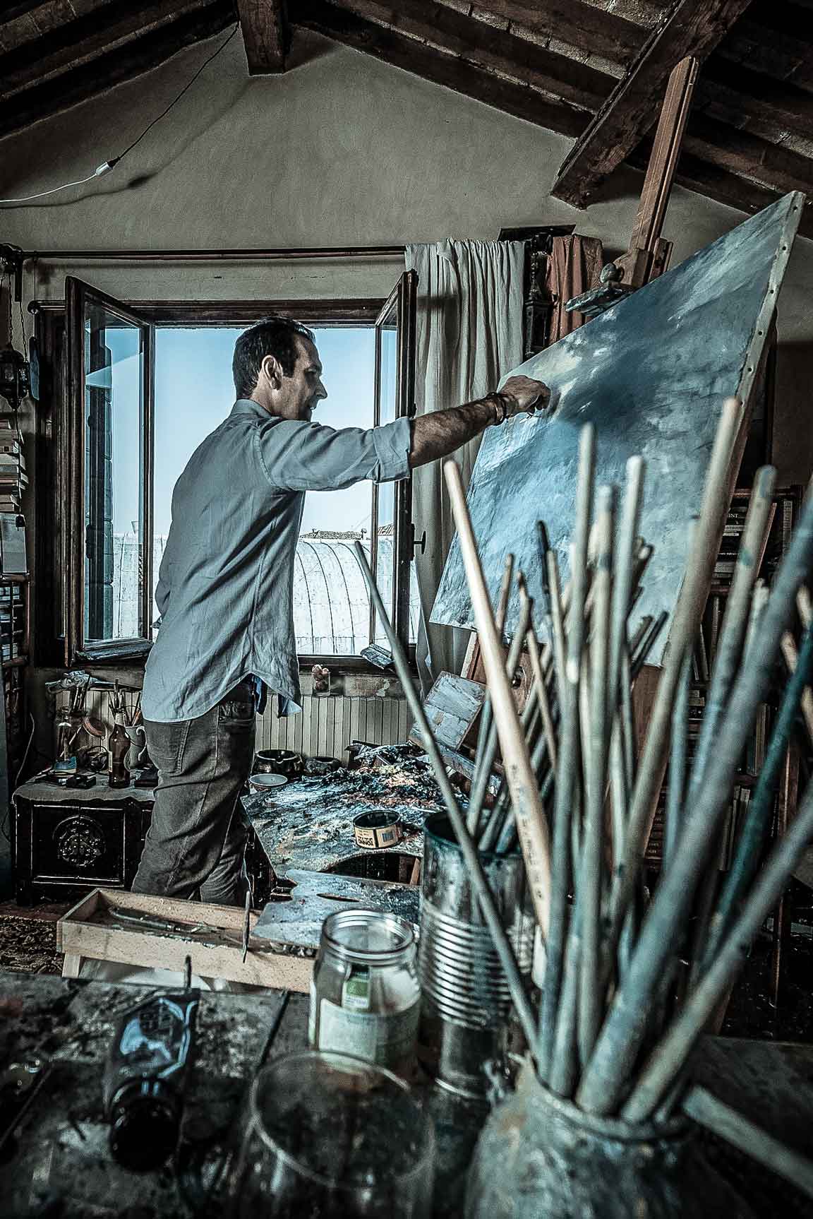 The painter Davide Battistin in his studio